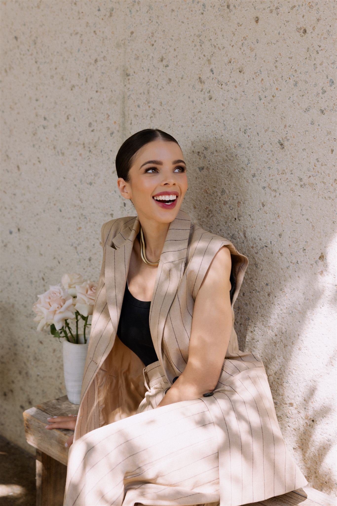 Eva founder of LVRS enjoying a moment with flowers