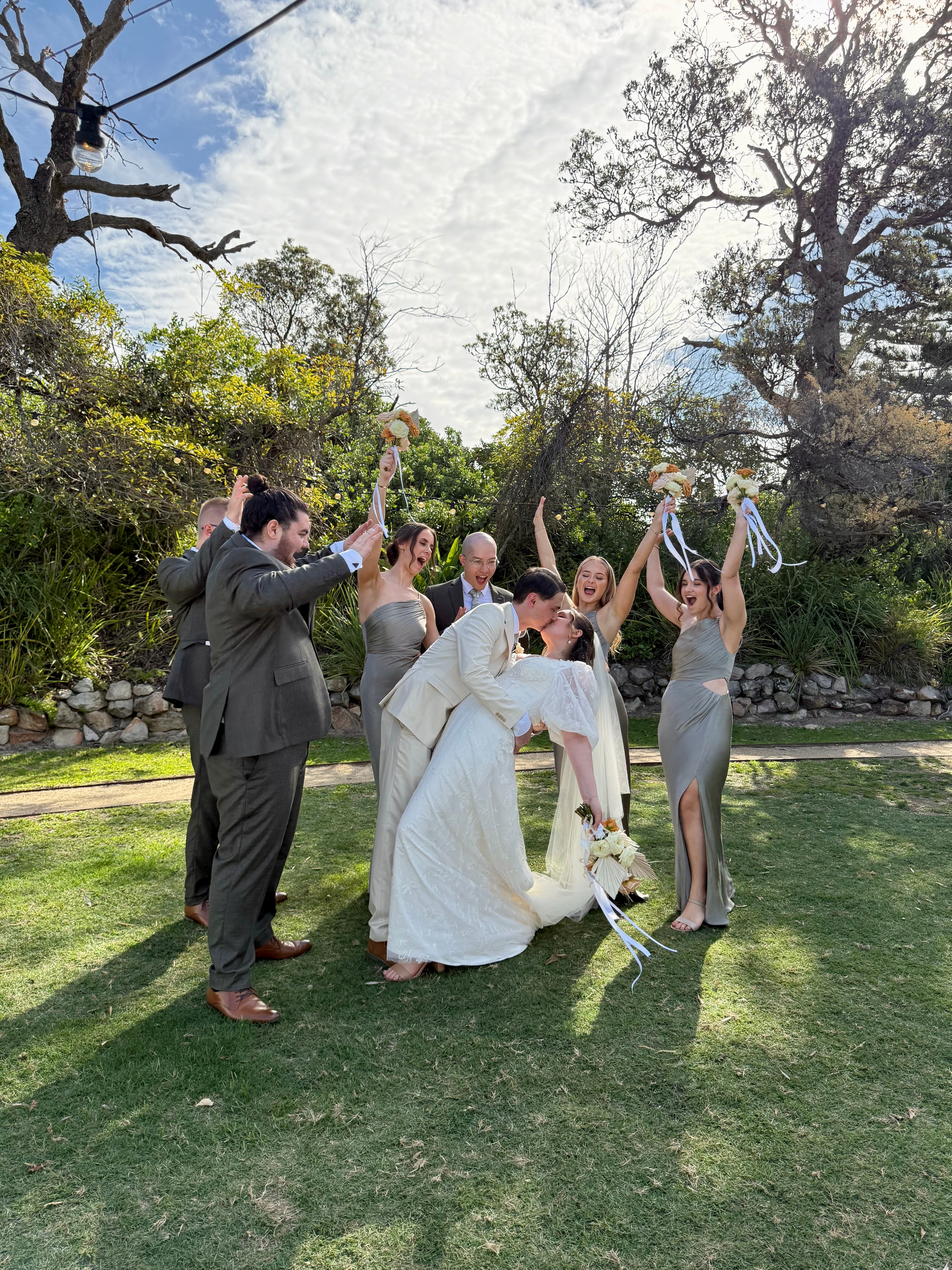 Bride and groom celebratory moment